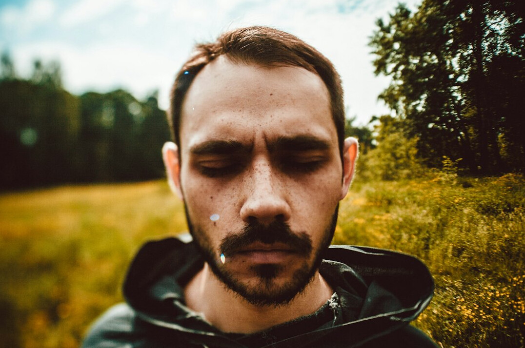 Portrait of a bearded man with a calm expression